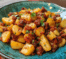 Un plato con papas con chorizo, si deseas una receta facil de hacer, receta de Chef Goya.